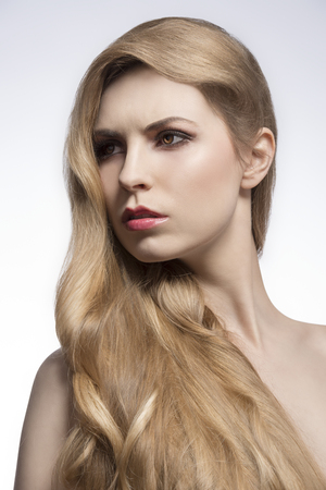 beauty shoot of beautiful woman with very long cute blonde hair, elegant hair-style. Extension の写真素材