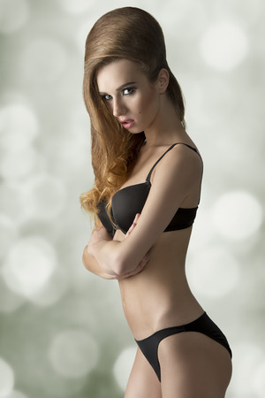 glamour shot of sexy girl with black lingerie and volume cute hair-style の写真素材