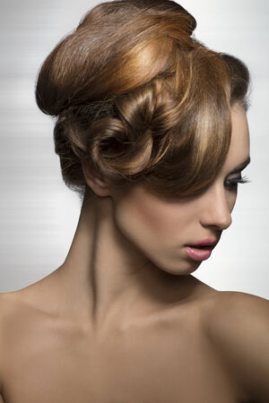 sensual girl posing in beauty close-up shoot with elegant hair-style, perfect skin and cute make-up の写真素材