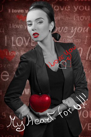 love girl ,creative heart shaped bag in the hands, just for valentines day , image in black and white , with hand made written.の写真素材