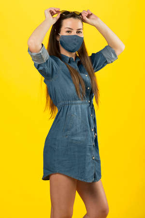 very cute fashion girl with hat in blue  jeans ready for a summer day of the momentの写真素材