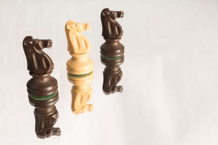 Chess photographed on a mirrorの写真素材