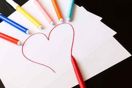 Colored pencils on a tableの写真素材