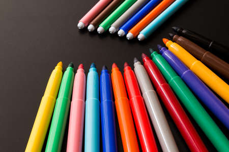 Colored pencils on a tableの写真素材