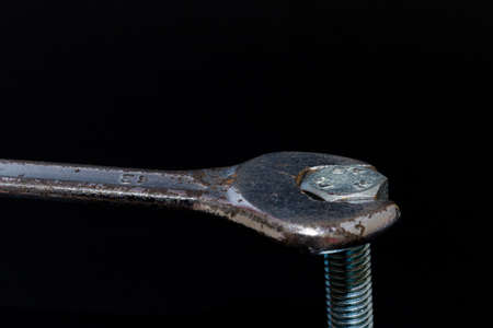 Key and pin photographed in the foreground on a neutral backgroundの写真素材