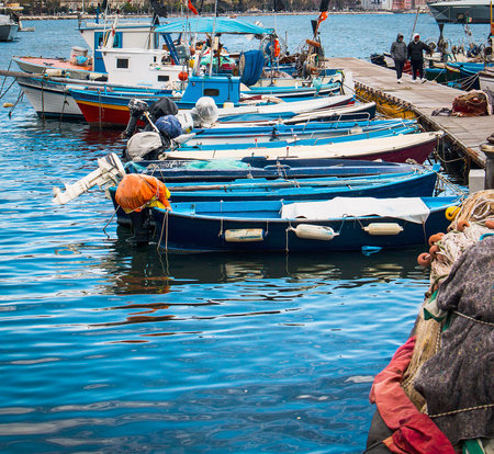 Fishing boats in the port of Naples, Italyの写真素材