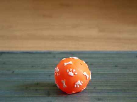 Ball pet toy on carpetの写真素材