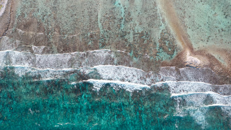 beautiful overhead view from a drone of the crystal clear waters and the barrier reef in the Caribbean Seaの写真素材