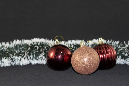 Christmas and New Year holidays background. Christmas balls on a black background.の写真素材