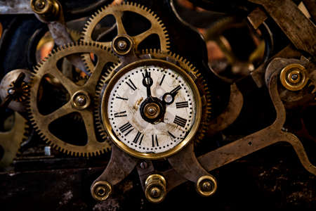 antique clock showing part of its interiorの写真素材