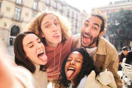 Selfie of cheerful friends goofing off. Happy people taking photo self portrait.の写真素材
