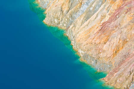 Old copper mine flooded with colorful colors