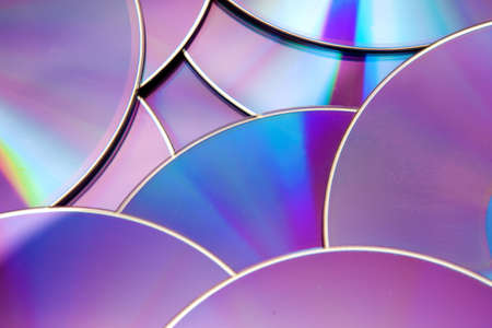 Abstract technology background with cd and dvdの写真素材