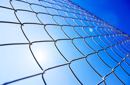Abstract background with metal gate and sunshineの写真素材