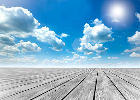 Wood floor and blue sky backgroundの写真素材