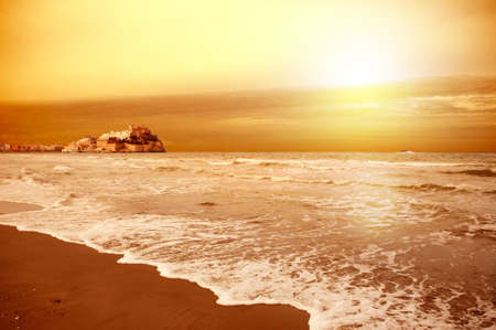 Dramatic sunset on a sea coast の写真素材