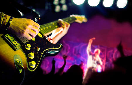 Live music background,Guitar player and publicの写真素材