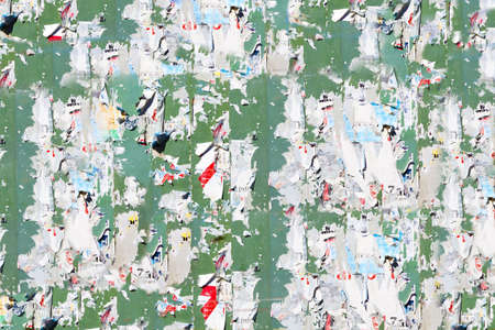 Abstract background.Wall and broken posters.の写真素材