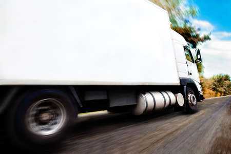 truck carrying merchandise.Close up image of wheels and rimの写真素材