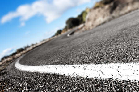 Detail curved road background.lines painted on the roadの写真素材