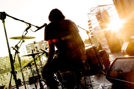 Live music background.Drummer on the stageの写真素材