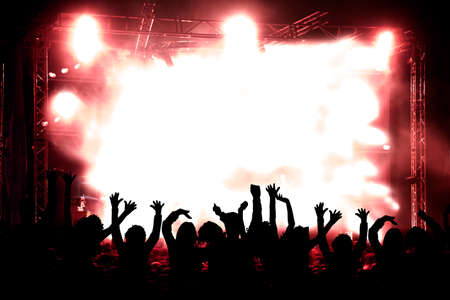 Live music background. Silhouettes of public and concertの写真素材