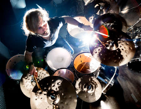 Man playing the drum.Live music background concept.Drummer and rock musicの写真素材