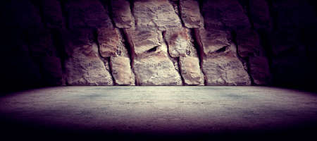 Cement floor and rock wall background and spotlightの写真素材