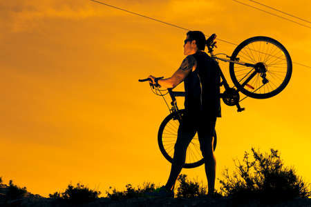 Extreme sports.Mountain bicycle and man.Life style outdoor extreme sportの写真素材