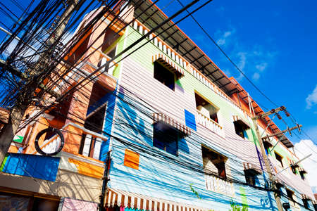 Thailand architecture.colorful facade.Light cables and light polesの写真素材