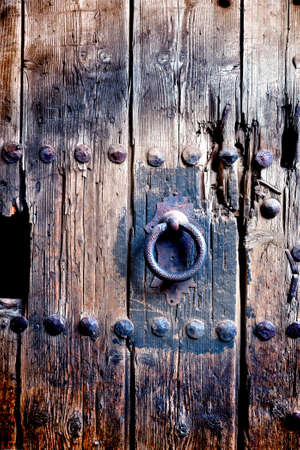 Old door handle background.Wood and metal aged doorknobの写真素材