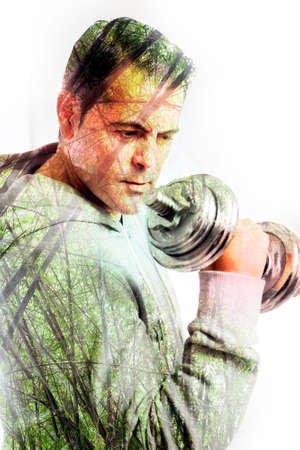 Gym equipment and sport concept.Strong and motion background.Dumbbells.Double exposure.の写真素材