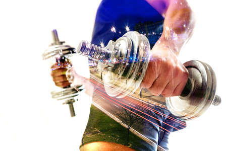 Gym equipment and sport concept.Double exposure background.Dumbbells.の写真素材