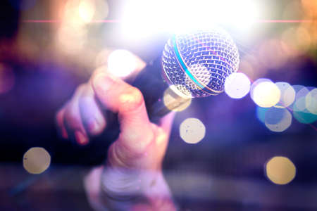 Live music background.Microphone and stage lights for karaoke and sing conceptの写真素材