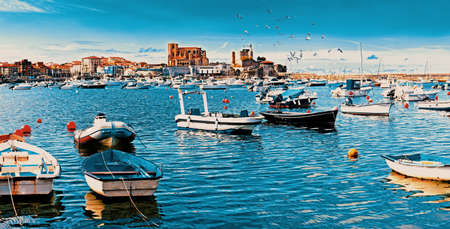 Scenery landscape of fishing port.Cityscape and boats in the sea.Cantabria village.Castrourdiales.の写真素材