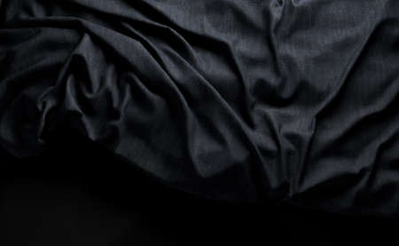 Abstract dark wrinkle fabric.Canvas texture detail in the dark.Smooth elegant dark silk or satin luxury cloth texture.3d illustrationの写真素材