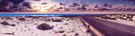 Road through the scenic landscape to the destination.の写真素材