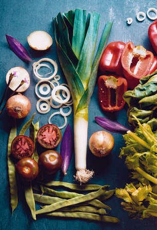 Healthy foods. Vegetables and fruits collection on black cement or stone background. Top view and copy space.の写真素材
