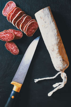 Iberian salchichon closeup design in slate tray