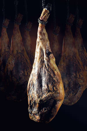 Slicing Spanish iberic ham. Spanish ham and traditional food.の写真素材