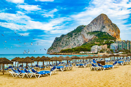 Rock of Penon by Ifach. Mediterranean coast landscape in the city of Calpe. Coastal city located in the Valencian Community, Alicante, Spain. Scenic Spain beach sunset.の写真素材
