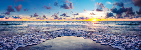 Dreamy sunset at beach shore.