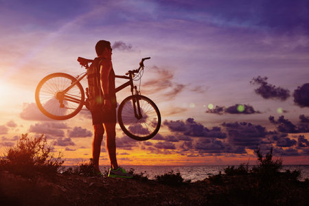 Extreme sports. Mountain bicycle and man. Life adventur style, recreation and leisure outdoor extreme sport.の写真素材
