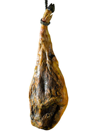 Whole dry Spanish ham isolated on white background.の写真素材