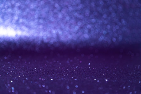 Purple glitter lights background. defocused and soft focus.の写真素材