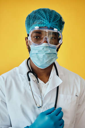 Male Doctor Wearing Protection From COVID-19の写真素材