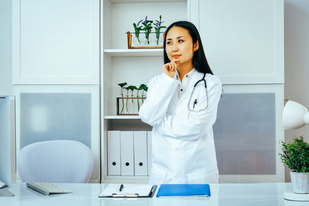 portrait of a young thoughtful female doctor in a hospital.の写真素材