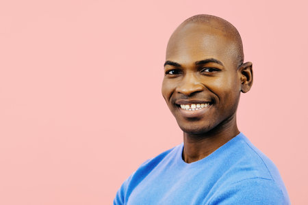 headshot man smiling looking at cameraの写真素材