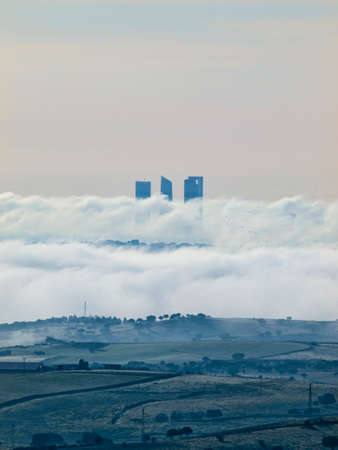 Cuatro Torres Business Area under clouds (Madrid, Spain)