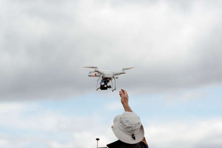Small consumer drone flying DJI Innovations Phantom 2のeditorial素材